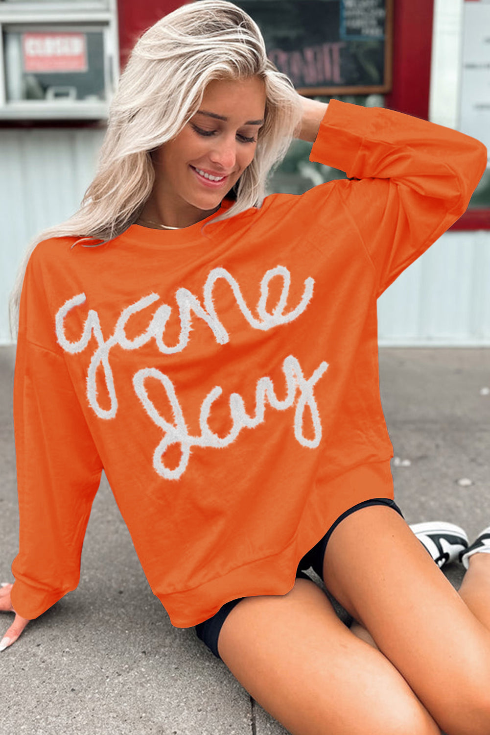 Russet Orange Tinsel Game Day Drop Shoulder Graphic Sweatshirt