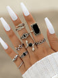 Jewelry 15-piece ring personality hollow lotus sunflower geometric black stone set ring